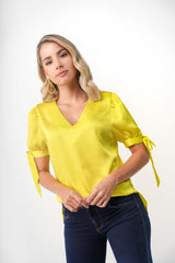 Blusa anudada con escote