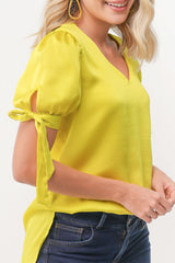 Blusa anudada con escote