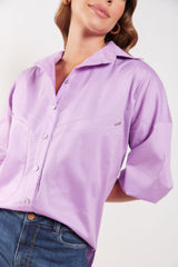 Camisa con bolsillos giagonales