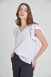 Blusa manga en golas abierta escote v en rayon