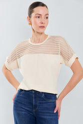 Tee shirt manga rodada con corte en crochet