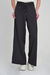 Pantalón palazzo canal y cierre delantero