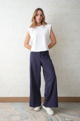 Pantalón palazzo bolsillos ribetes