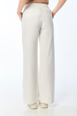 Pantalón palazzo pretina resortada y tira de anudar