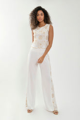 Pantalón palazzo corte en combinación bordada