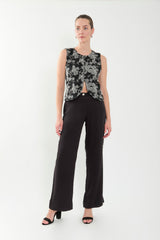 Chaleco corto bordado con botones forrados