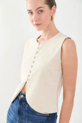 Chaleco corto unicolor con botones forrados