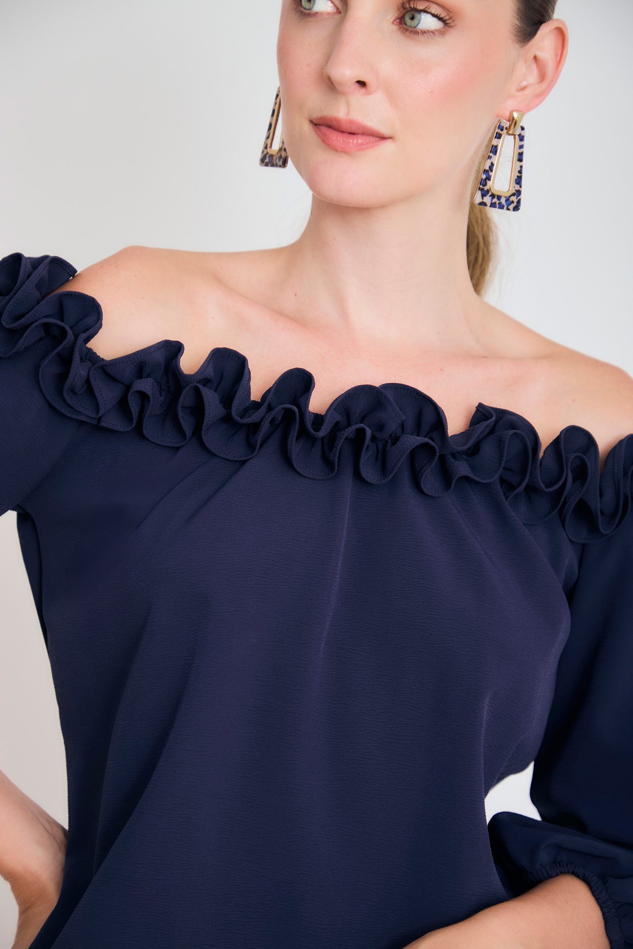 Blusa off shoulder ruche