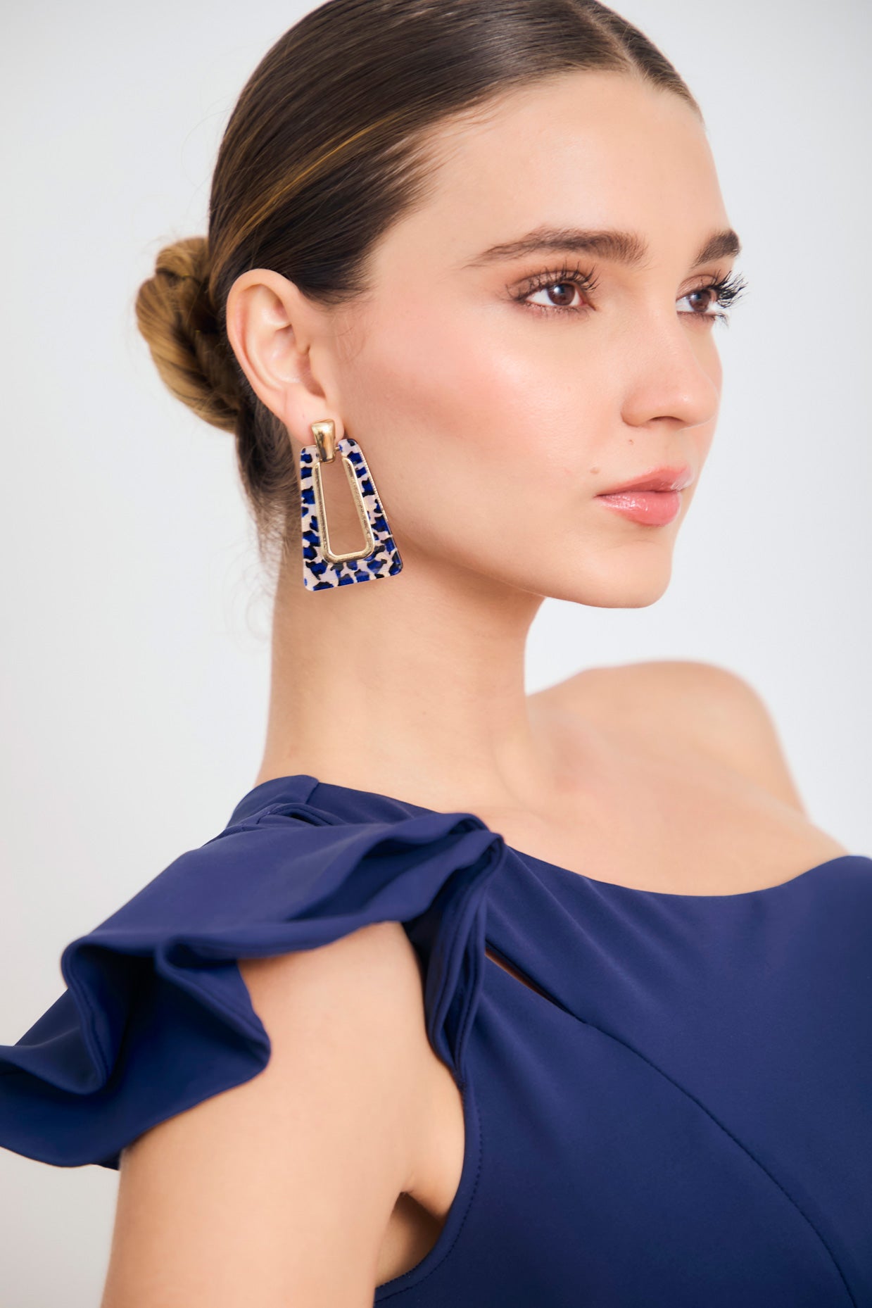 Blusa solo hombro capas