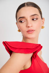 Blusa solo hombro capas