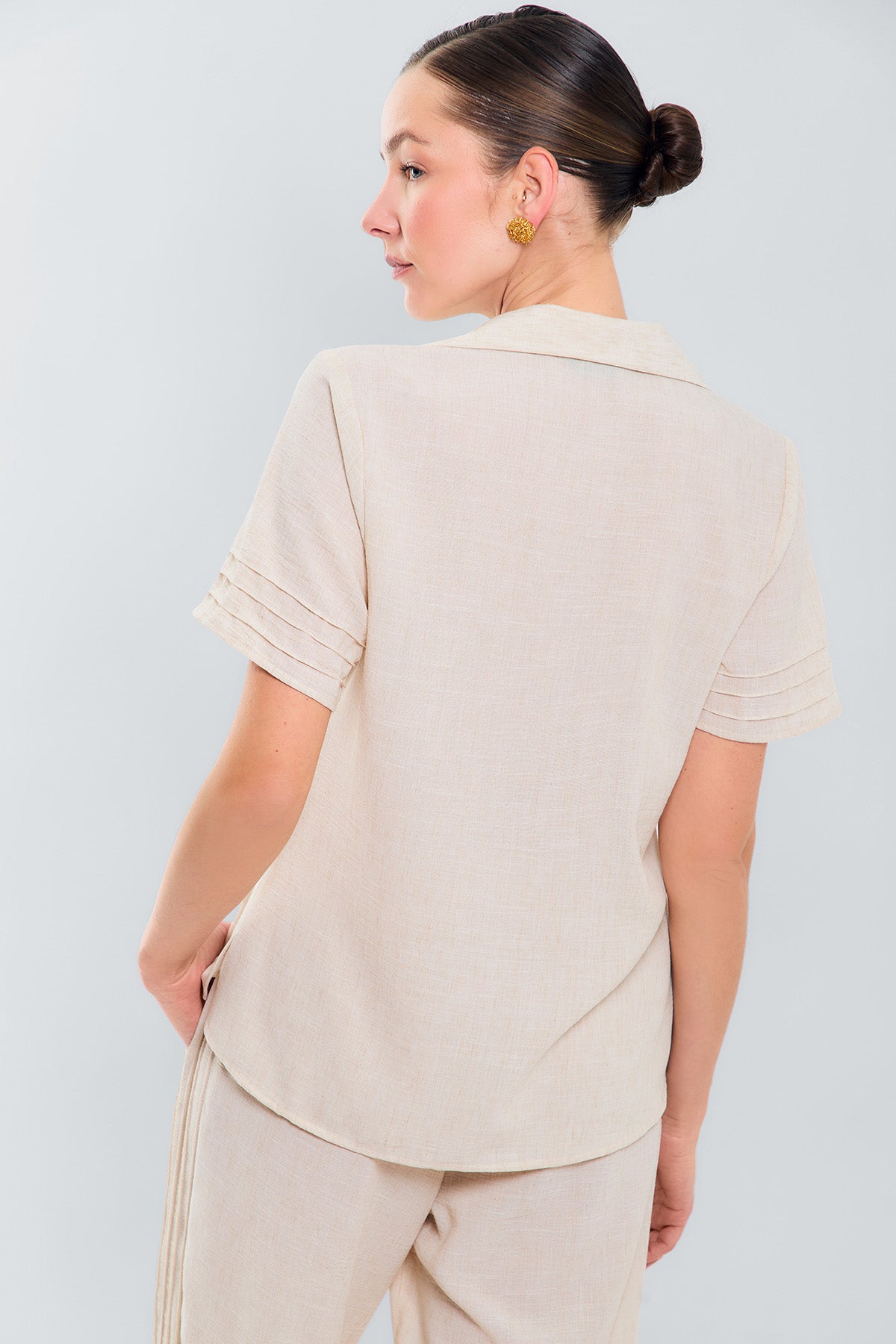 Bluson manga corta con alforzas