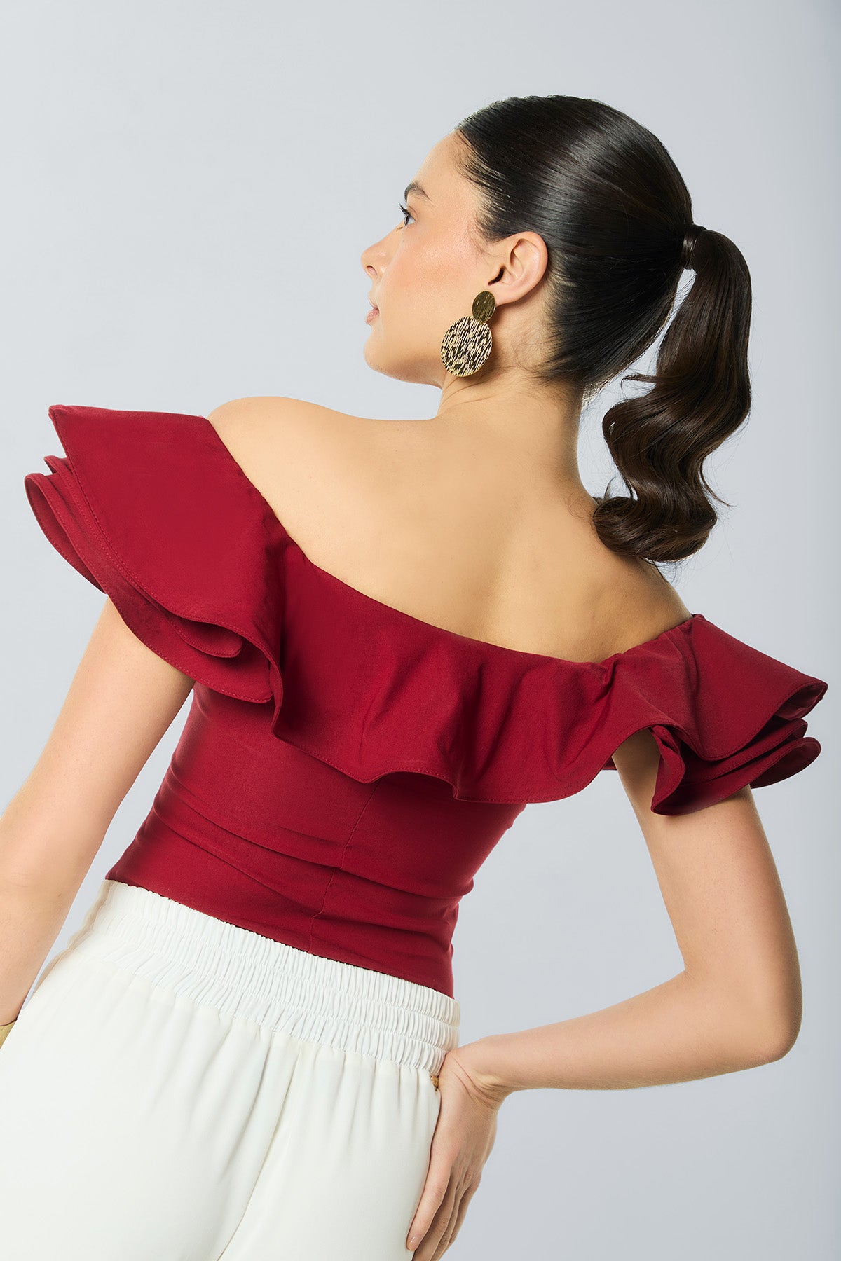 Blusa off shoulder con bolero y mangas