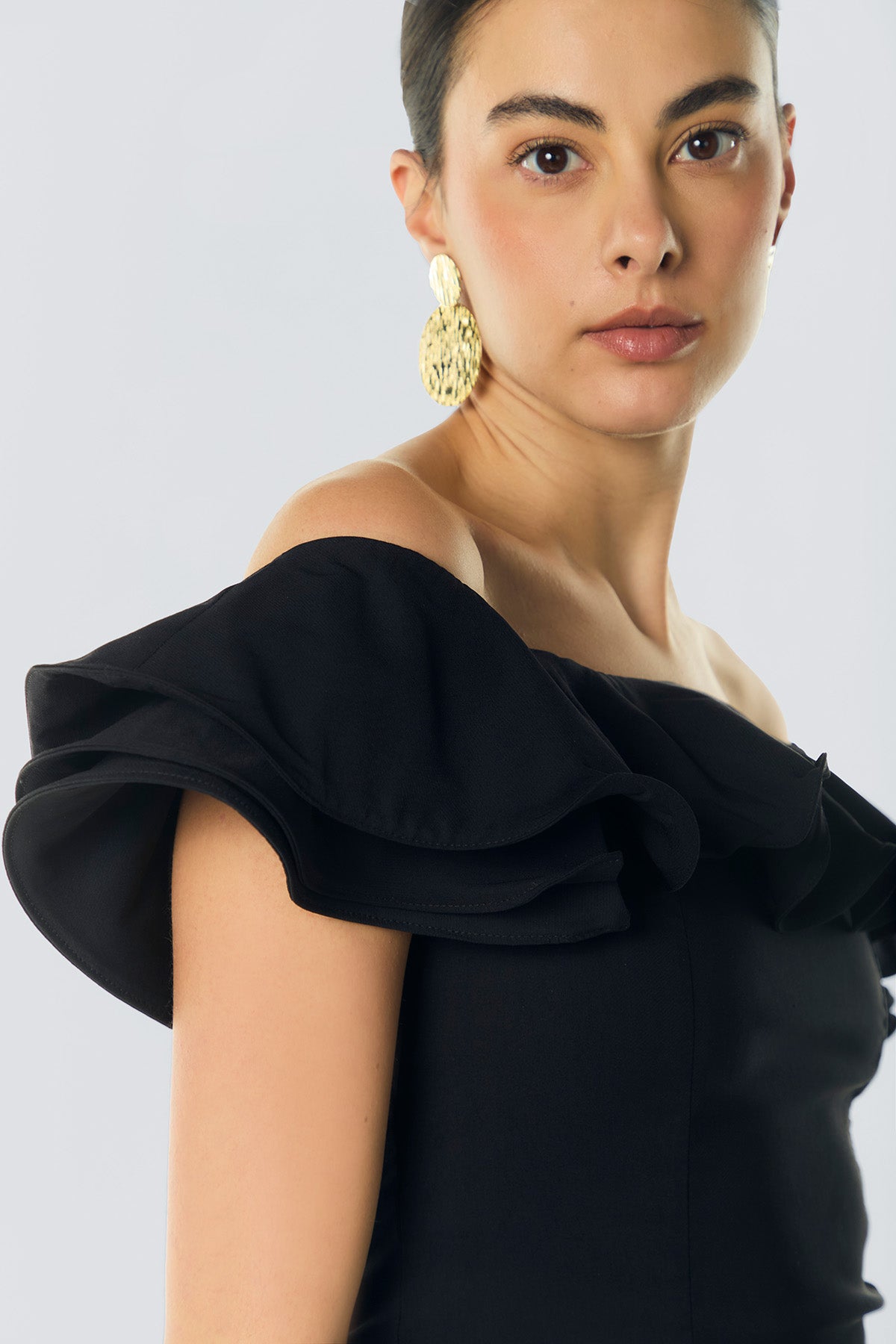 Blusa off shoulder con bolero y mangas