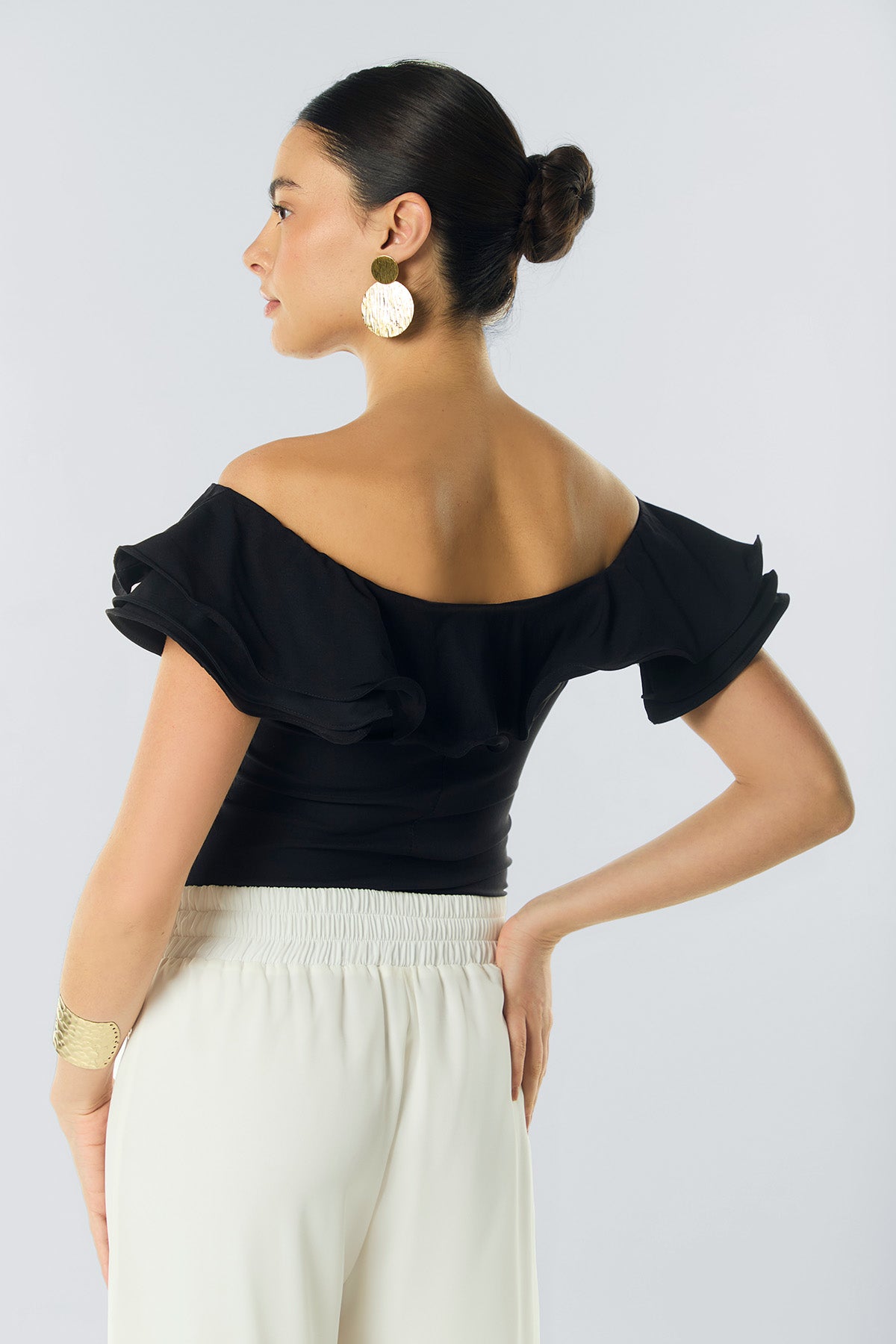 Blusa off shoulder con bolero y mangas