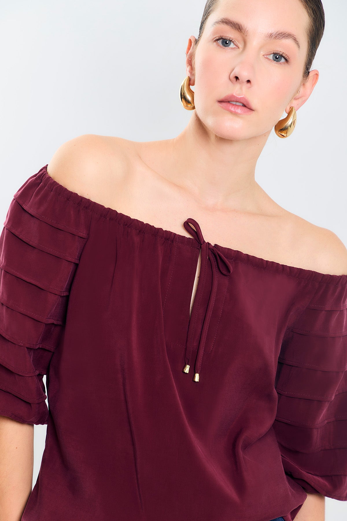 Blusa off shoulders m3/4 c/alforza