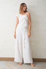 Pantalón palazzo cinturón con terminal en hojas