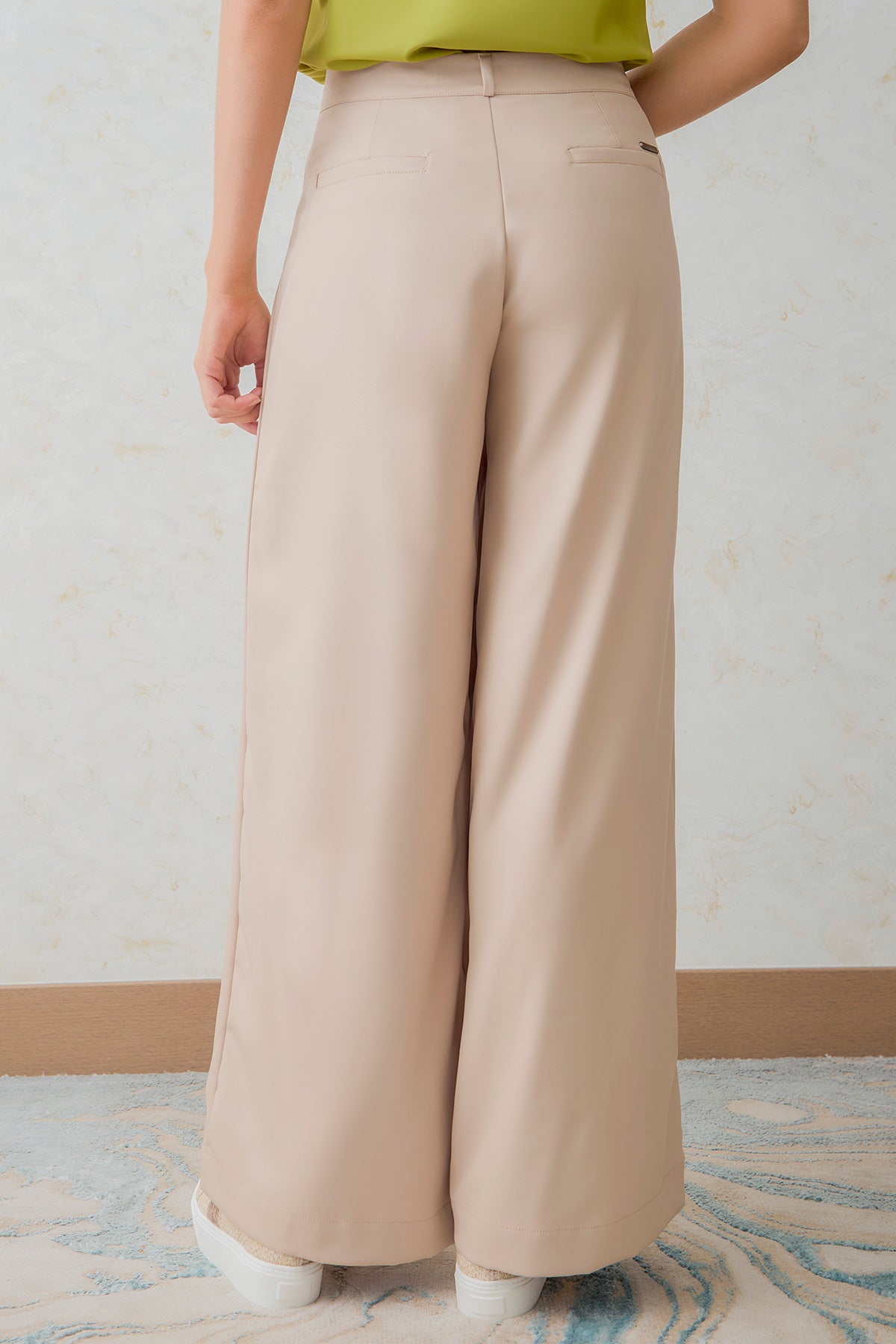 Pantalón palazzo bolsillos ribetes