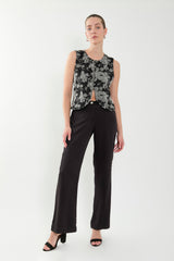 Pantalón palazzo bolsillos parche y cargo en rayon