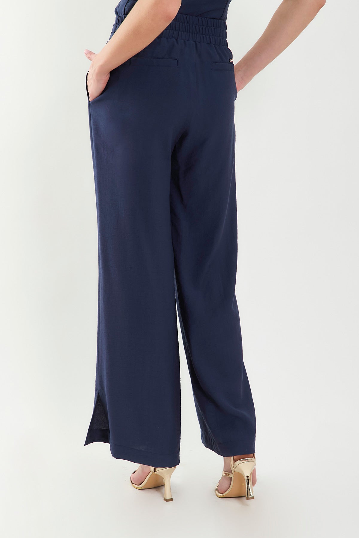 Pantalón palazzo con alforzas