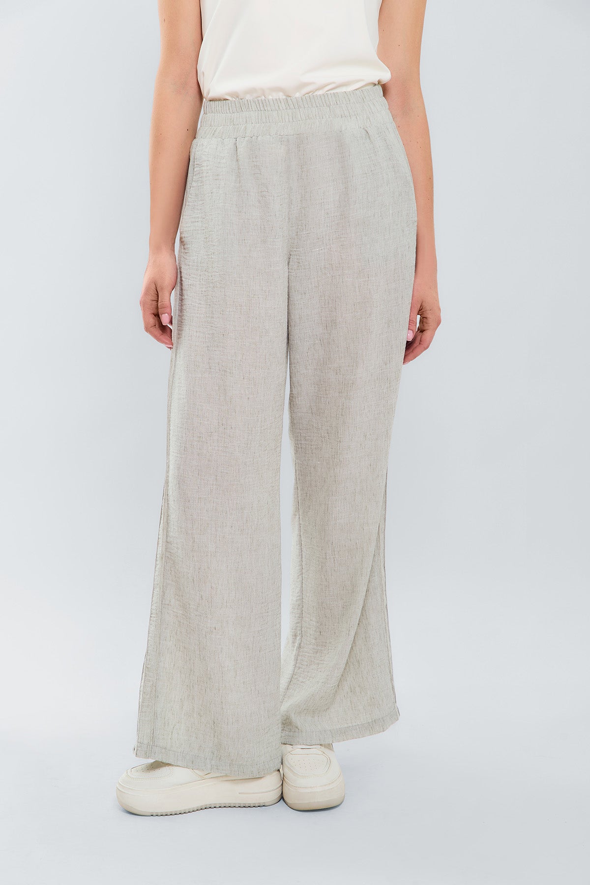Pantalon palazzo pretina resortada con alforzas laterales